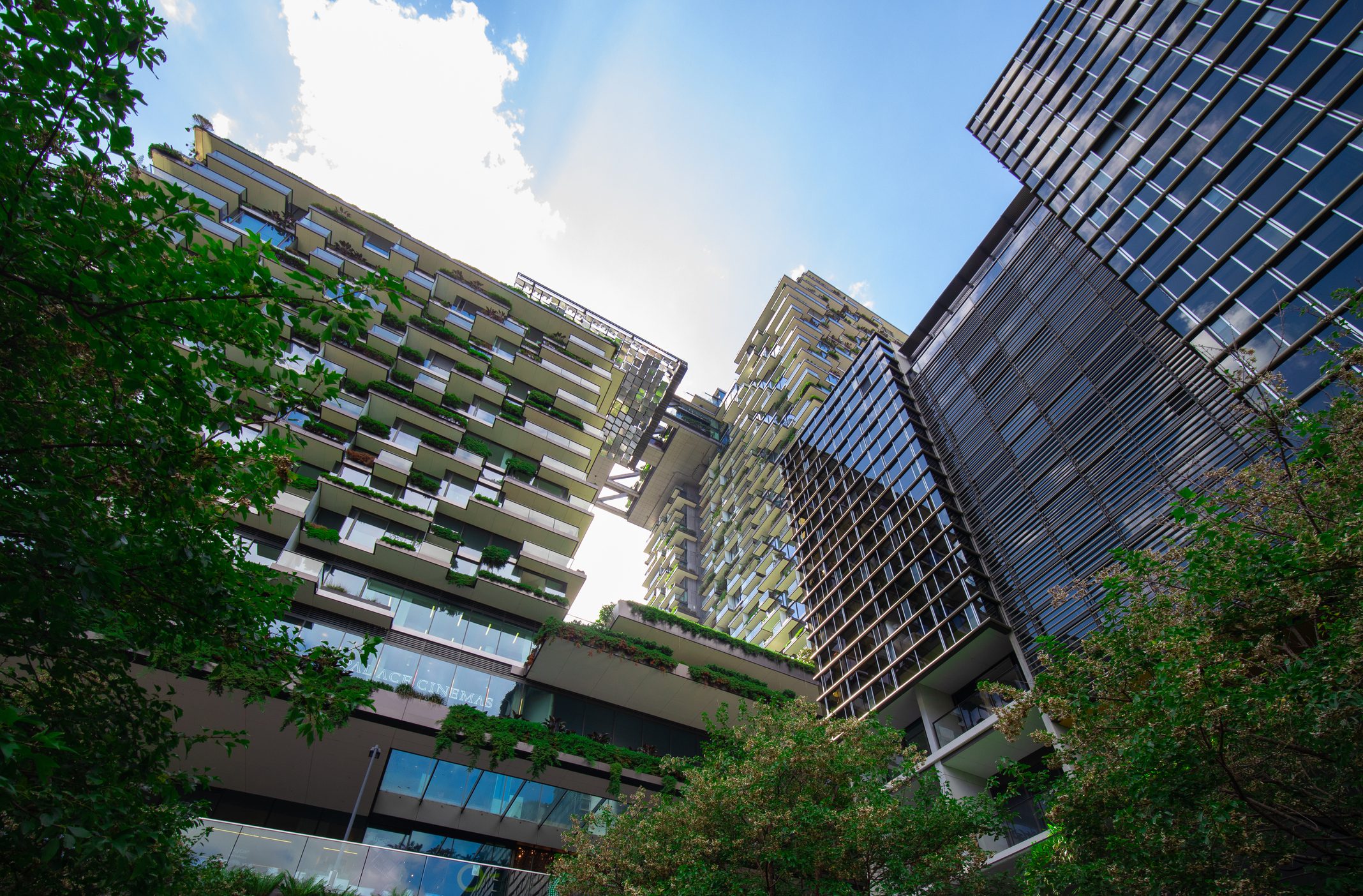 apartment block in sydney nsw australia with hanging gardens and plants on exterior of the building